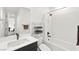 Well-lit bathroom with a tub/shower combination, white subway tile, and a modern vanity at 2004 Peaceful Mesa Ct, Henderson, NV 89052