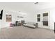 Bright loft space with carpeted floors and backyard views at 2004 Peaceful Mesa Ct, Henderson, NV 89052