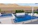 Backyard rendering showing a luxurious pool and spa with white lounge chairs and manicured landscaping at 2004 Peaceful Mesa Ct, Henderson, NV 89052