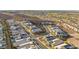 Aerial view of a new neighborhood features modern homes with desert landscaping, offering a glimpse of community living at 2004 Peaceful Mesa Ct, Henderson, NV 89052