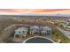 Picturesque street view features contemporary homes showcasing modern architecture, desert landscaping, and a well-planned community layout at 2004 Peaceful Mesa Ct, Henderson, NV 89052