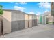 Three storage sheds on a concrete pad, ideal for yard equipment and tools at 2058 Citroen St, Las Vegas, NV 89142