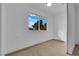 Bright bedroom featuring a single window with a view and carpet flooring at 2058 Citroen St, Las Vegas, NV 89142