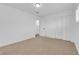 Bright bedroom with neutral carpet, white walls, and ample closet space at 2058 Citroen St, Las Vegas, NV 89142