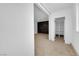 Bedroom leading to a closet and featuring a dark accent wall at 2058 Citroen St, Las Vegas, NV 89142