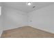 Clean bedroom offers neutral carpet, a ceiling light, and a closet for ample storage at 2058 Citroen St, Las Vegas, NV 89142