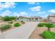 Charming home with a well-manicured front yard and a long driveway at 2058 Citroen St, Las Vegas, NV 89142