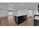 Bright, open kitchen with a large island and stainless steel appliances at 2058 Citroen St, Las Vegas, NV 89142