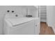 Laundry room featuring a washer and dryer along with storage shelves at 2058 Citroen St, Las Vegas, NV 89142