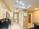 Well-lit kitchen with light wood cabinets, modern appliances, and a functional layout at 210 E Flamingo Rd # 215, Las Vegas, NV 89169