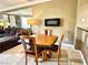 Inviting living room with a dining table and fireplace, offering a cozy and stylish living space at 210 E Flamingo Rd # 215, Las Vegas, NV 89169