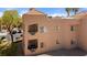 A high-angle view of desert condo balconies with outdoor furniture and decor, offering a cozy outdoor retreat at 2200 Highpointe Dr # 202, Laughlin, NV 89029