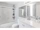 Bright bathroom with a shower-tub combo, sleek vanity with quartz countertop, and modern fixtures at 2200 Highpointe Dr # 202, Laughlin, NV 89029