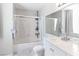 Bright bathroom with a shower-tub combo, sleek vanity with quartz countertop, and modern fixtures at 2200 Highpointe Dr # 202, Laughlin, NV 89029