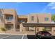 Well-maintained building exterior with covered parking, desert landscaping, and clearly marked unit numbers at 2200 Highpointe Dr # 202, Laughlin, NV 89029