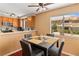 Well-lit dining area with garden views adjacent to the kitchen at 2200 Highpointe Dr # 202, Laughlin, NV 89029