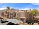 Beautiful condo featuring tan stucco, tile roofing, and convenient covered parking at 2200 Highpointe Dr # 202, Laughlin, NV 89029
