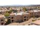 Inviting condo featuring tan stucco, tile roofing, and charming balcony at 2200 Highpointe Dr # 202, Laughlin, NV 89029