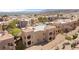 Inviting condo featuring tan stucco, tile roofing, and charming balcony at 2200 Highpointe Dr # 202, Laughlin, NV 89029