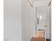 This hallway has neutral walls, carpet floors, and doorways to a closet and a bathroom at 2200 Highpointe Dr # 202, Laughlin, NV 89029