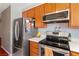 Updated kitchen featuring stainless steel appliances and abundant counter space at 2200 Highpointe Dr # 202, Laughlin, NV 89029