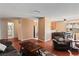 Open concept living room with wood floors and an adjacent dining and kitchen area at 2200 Highpointe Dr # 202, Laughlin, NV 89029