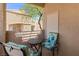 Private patio with seating area, offering a relaxing outdoor space with scenic views at 2200 Highpointe Dr # 202, Laughlin, NV 89029