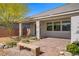 Backyard patio featuring a seating bench, garden, and view at 2433 Cingoli St, Henderson, NV 89044