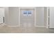 Hallway leading to rooms with plenty of natural light and neutral tones at 2433 Cingoli St, Henderson, NV 89044