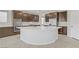 Gourmet kitchen with stainless steel appliances and a large center island for cooking at 2433 Cingoli St, Henderson, NV 89044