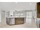 Bright kitchen features stainless steel appliances and a spacious center island at 2433 Cingoli St, Henderson, NV 89044