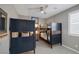 Charming bedroom with bunk beds, ceiling fan, and a cozy atmosphere perfect for children or guests at 2489 Cingoli St, Henderson, NV 89044