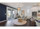 Comfortable living space featuring modern lighting, stylish furniture, and sliding door access to the outdoor at 2489 Cingoli St, Henderson, NV 89044
