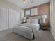 Cozy bedroom features neutral tones, carpet and closet at 2631 Chance Canyon St, Henderson, NV 89044