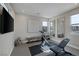 Home gym with mirrors, windows, television, and exercise equipment at 2631 Chance Canyon St, Henderson, NV 89044