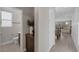 Bright hallway leading to various rooms, showcasing modern design and stylish accents at 2631 Chance Canyon St, Henderson, NV 89044