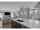 Bright, open kitchen featuring a large island with a sink, perfect for modern living and entertaining at 2631 Chance Canyon St, Henderson, NV 89044