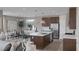 Spacious open-concept living and dining area with elegant decor and modern lighting at 2631 Chance Canyon St, Henderson, NV 89044