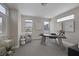 Bright and contemporary home office with modern desk, comfortable seating, and natural light at 2631 Chance Canyon St, Henderson, NV 89044