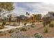 Community playground with play equipment, picnic tables, and desert landscaping at 2631 Chance Canyon St, Henderson, NV 89044
