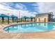 Community pool with shaded cabanas, lounge chairs, and a nearby recreation building at 2631 Chance Canyon St, Henderson, NV 89044