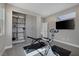 This workout room has storage, TV, carpet and workout equipment at 2631 Chance Canyon St, Henderson, NV 89044