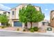 Lovely two-story home with a well-maintained yard and attached garage at 2672 Painted Mist Ct, Las Vegas, NV 89142