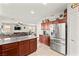 Open kitchen with stainless steel appliances and ample counter space at 2672 Painted Mist Ct, Las Vegas, NV 89142