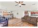 Open-concept living room featuring hardwood floors and a neutral color palette at 2672 Painted Mist Ct, Las Vegas, NV 89142