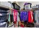 Functional walk-in closet with ample shelving, hanging space, and organizational units at 2672 Painted Mist Ct, Las Vegas, NV 89142