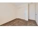 Bedroom with sliding door closet and neutral color scheme at 2728 Holmfault St, Henderson, NV 89044