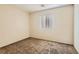Bedroom featuring neutral walls, carpet floors, and a window at 2728 Holmfault St, Henderson, NV 89044