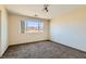 Spacious bedroom with soft carpeting, ample natural light, and a peaceful, airy ambiance at 2728 Holmfault St, Henderson, NV 89044