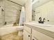 Updated bathroom features stylish vanity, shower with tiled wall, and modern fixtures at 3151 Soaring Gulls Dr # 1023, Las Vegas, NV 89128